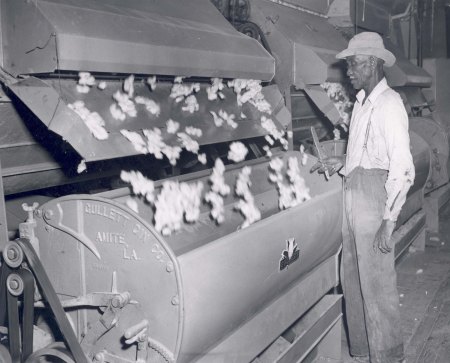 Africian American worker at a Cotton Gin,